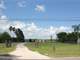 5.29 Fenced Pasture Land with Mobile Home Barns and Sheds