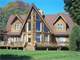 Acre Ranch with Custom Built Log Home and State the Art Horse Trainin