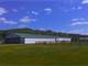 Beautiful 27-Stall Barn with Indoor Arena and 5 Acres