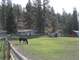Small Horse Farmin Western Montana with Charming One Story Home