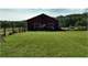 1935 Farmhouse ON Acres with Stream Barn Fencing Mountain Views Photo 11